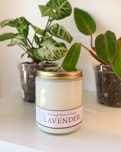 Lavender candle in minimalist glass container with gold lid, soy wax blend with clean floral and herbal scent from Botanical Collection