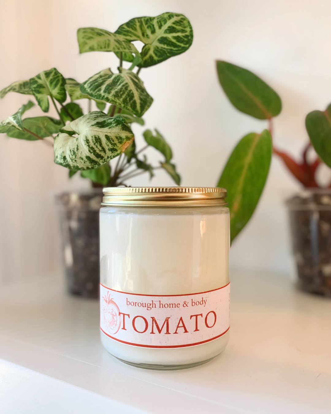 Tomato leaf soy candle in rustic glass jar with gold lid, Botanical Collection scent with green, herbaceous summer garden aroma