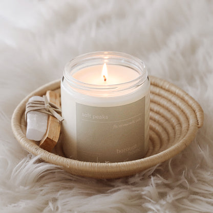 Soft Peaks candle in bowl, front view.