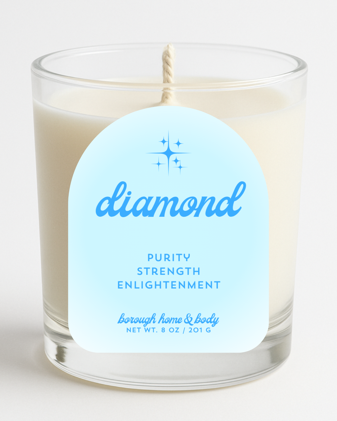 Front view of April Diamond Birthstone Candle with white and silver-toned label, in an 8 oz clear glass jar on a white background.