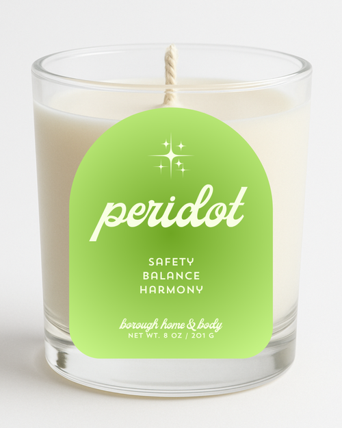 Front view of August Peridot Birthstone Candle with bright green label, in an 8 oz clear glass jar on a white background.