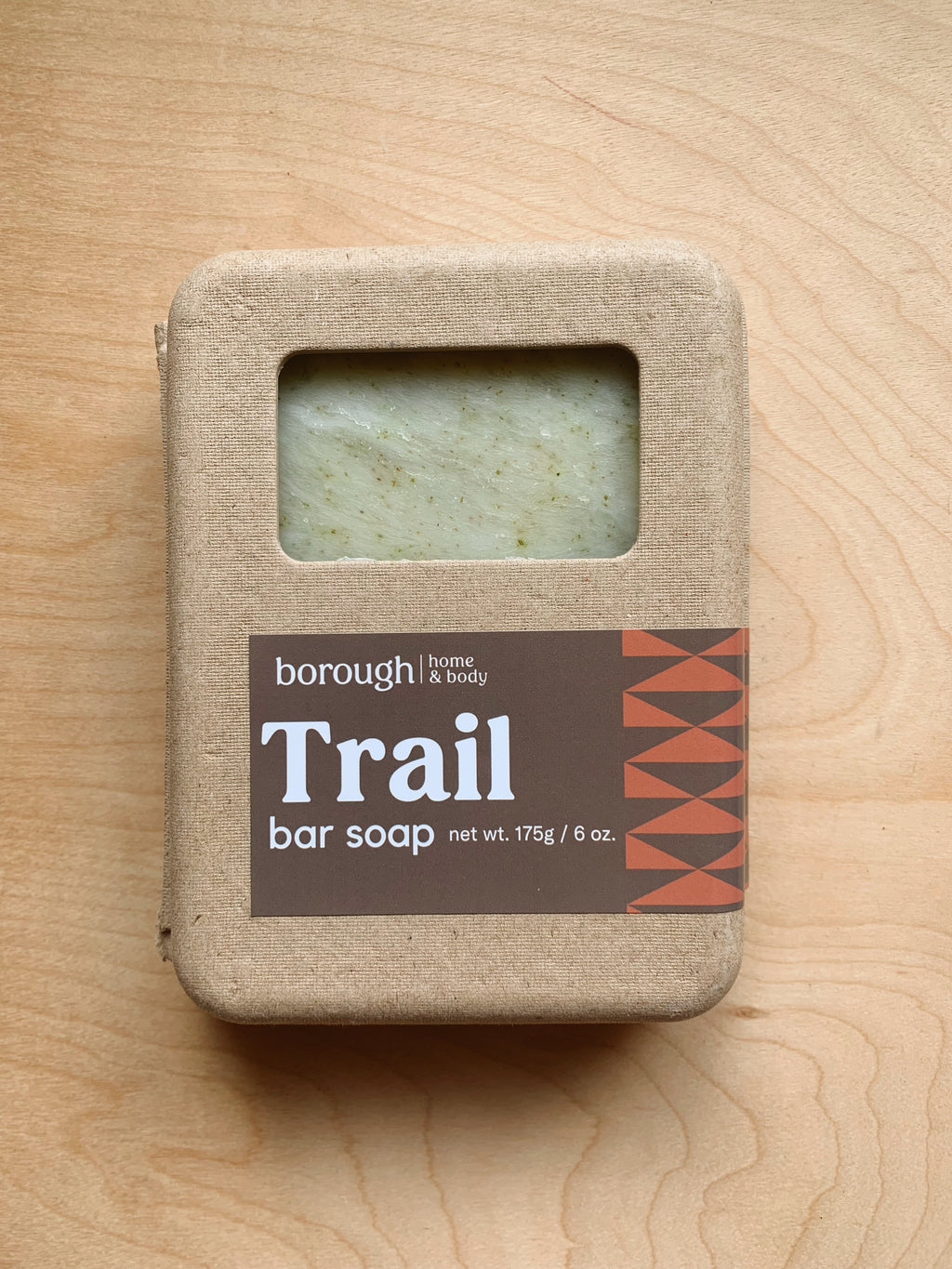 Kraft clamshell box of trail soap, top-down view