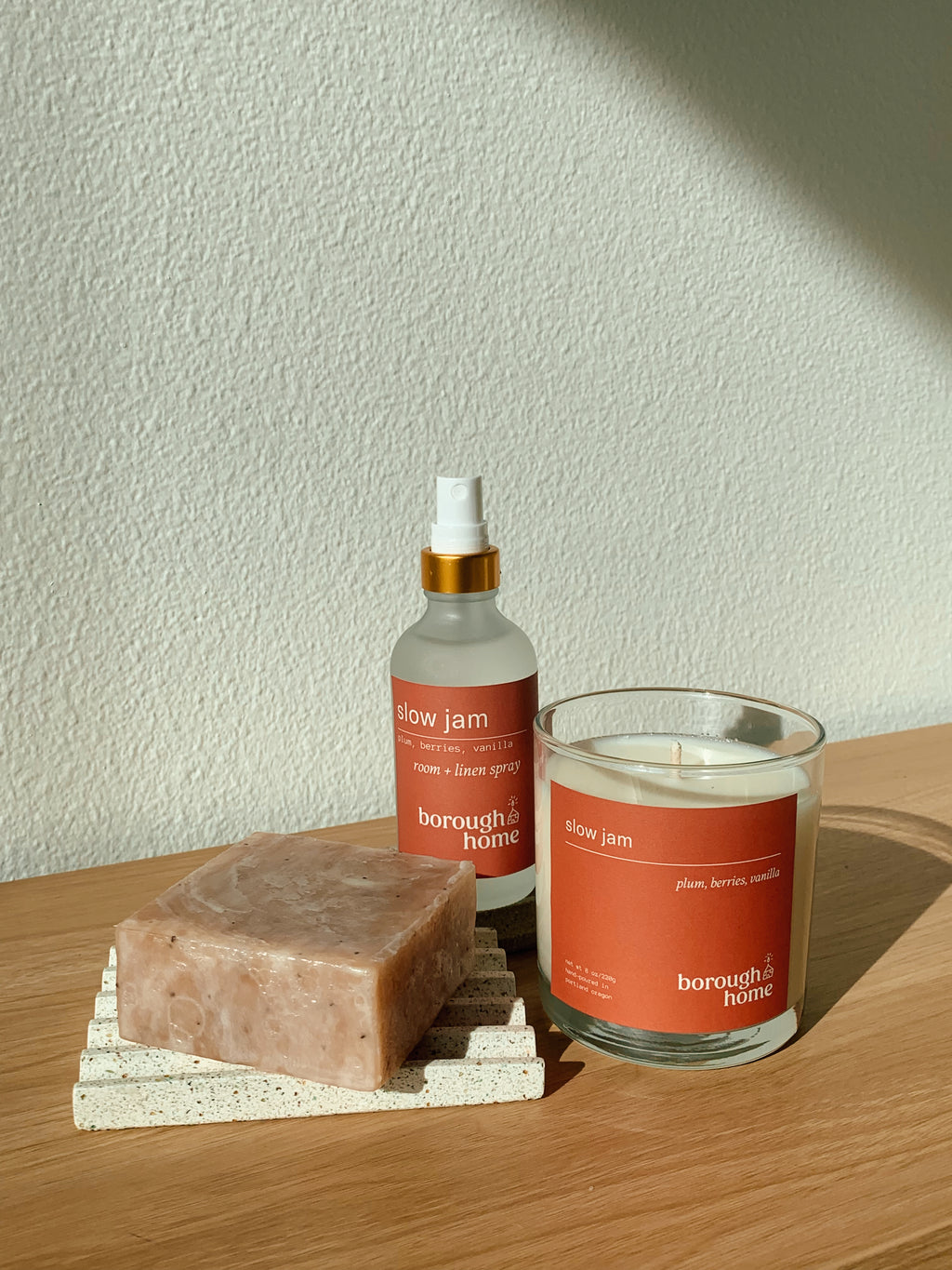 Slow Jam home fragrance collection, with bar soap, room and linen spray and scented candle, front view